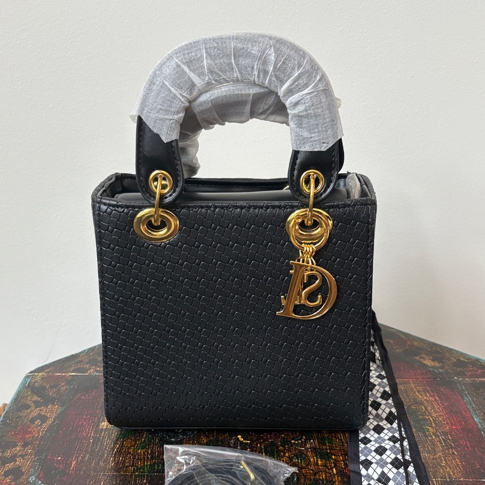 Elegant Black Handbag with Gold Hardware